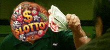 a man is holding a pile of money in front of a balloon that says lotto