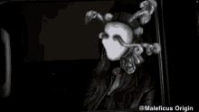 a picture of a woman with a mask and the word sorry on the side