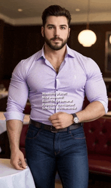 a man in a purple shirt and blue jeans is standing in a restaurant