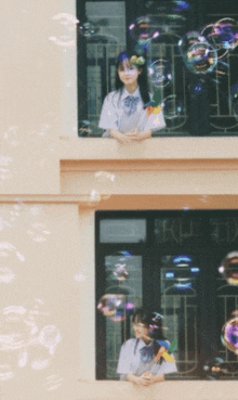 a girl stands on a balcony with bubbles coming out of the window