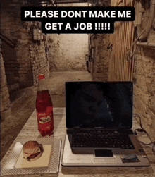 a bottle of minute maid sits next to a laptop on a table