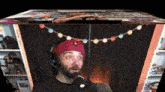 a man wearing headphones is talking into a microphone