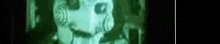 a blurred image of a person standing in a dark room .