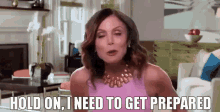 One Sec GIF - Hold On I Need To Get Prepared Fixing Hair GIFs