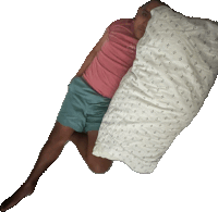 a man in a pink shirt is laying on his stomach with a white pillow