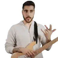 a man with a beard is holding a guitar with his hands outstretched