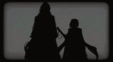 a silhouette of a man and woman holding hands