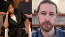a man with curly hair and a man with a beard are sitting next to each other