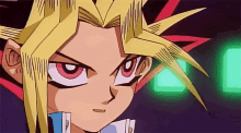 a close up of a cartoon character 's face with red eyes and yellow hair