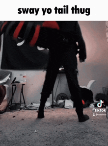 a sway yo tail thug is written above a person 's feet