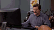 Ron Swanson Throwing Away His Computer - Parks And Recreation GIF - Throwing Computer Ron Swanson Parks And Recreations GIFs
