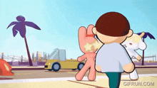 a gif from gifrun.com shows a man and a stuffed animal