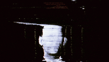 a black and white image of a man 's face with the words " look at what you 're doing to me "