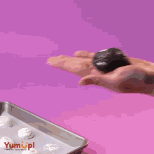 a bunch of cookies on a tray that says yumup on it