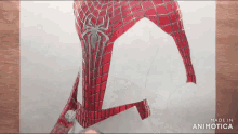 a drawing of a spider man is being made in animatica