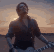 Johnny Depp Sauvage GIF - Johnny Depp Sauvage Guitar GIFs