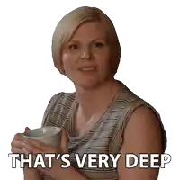 a woman holding a cup of coffee with the words that 's very deep above her