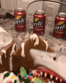 Shark Puppet Gingerbread House GIF - Shark Puppet Gingerbread House Holidays GIFs