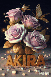 a bouquet of purple roses in a vase with the name akira in gold letters