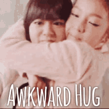 Hug Awkward GIF - Hug Awkward Love GIFs