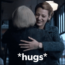 a woman hugging another woman with the words * hugs * written on the bottom