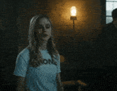 a woman wearing a shirt that says bronx