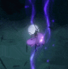 a close up of a person holding a sword in a dark room .