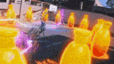 a basketball court with a bunch of yellow bottles with the letter o on the top