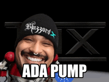 a man wearing a beanie that says blazzard x on it