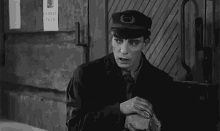Buster Keaton Scheming GIF