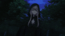 a woman with long blonde hair is wearing a mask and a hood