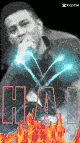 a man singing into a microphone with the word hai written in red