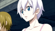 a girl with short white hair and blue eyes stands next to another girl