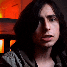 a close up of a man 's face with the word a gifs on the bottom right