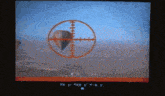 a television screen shows a hot air balloon in a crosshair