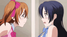 two anime girls are standing next to each other and one is angry