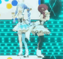 two anime girls are dancing on a stage in front of a blue background .