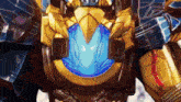 a close up of a toy robot with a blue light coming out of it 's chest