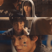 a man with a tattoo on his face looks at a woman