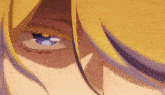 a close up of a person 's blue eye