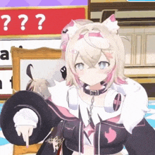 a girl with a cat ear and headphones is holding a hat and pointing at something .