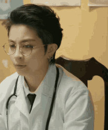 a doctor wearing glasses and a stethoscope around her neck