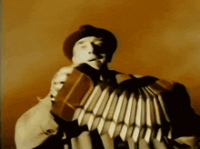Man-playing-accordion Concertina GIF - Man-playing-accordion Concertina Hand-accordion GIFs