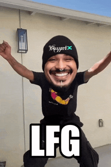 a man wearing a beanie and a t-shirt with the word lfg on it