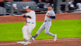 a baseball player wearing a jersey that says astros on it