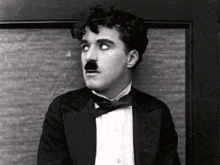 Charlie Chaplin Wink GIF