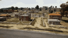 a screenshot of a video game with a few houses and trees