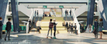 a group of people standing in front of a building with a sign that says fifa on it