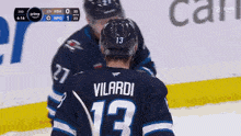a hockey player with the name vilardi on his back