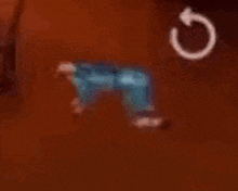 a blurred image of a person standing on a red surface with a white circle in the middle .
